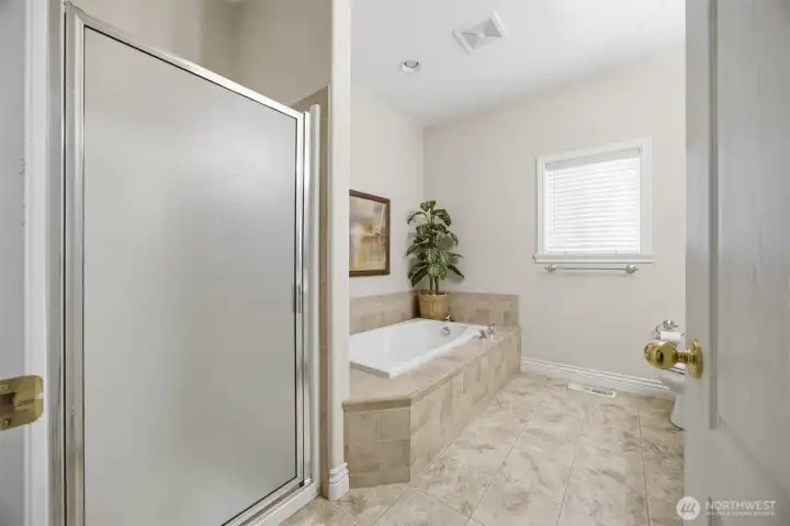 on suite bath with separate shower & tub