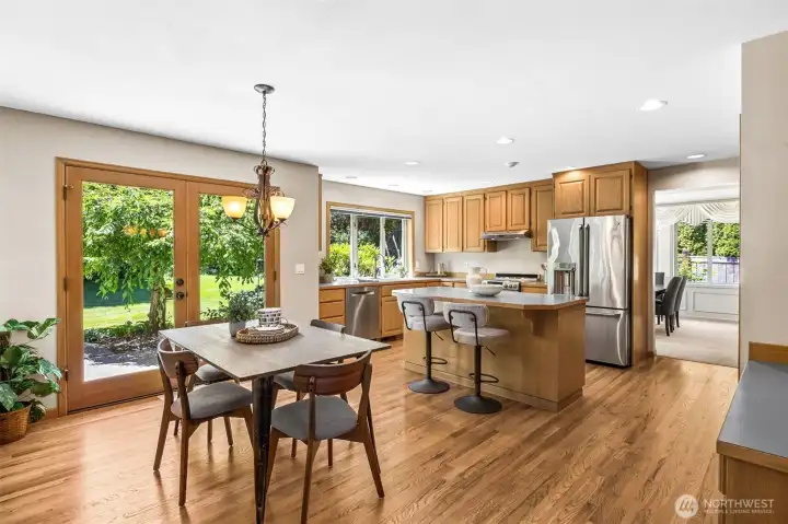 The kitchen features a breakfast nook and French door access to the back yard. The kitchen features a breakfast nook and French door access to the back yard.