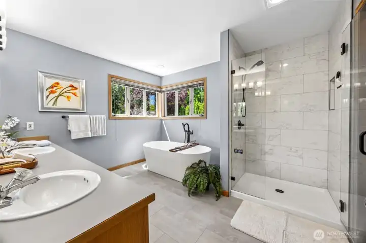 The Primary Bath includes some lovely updates including a stand alone soaking tub, walk in shower and spacious walk in closet (not pictured). The Primary Bath includes some lovely updates including a stand alone soaking tub, walk in shower and spacious walk in closet (not pictured).