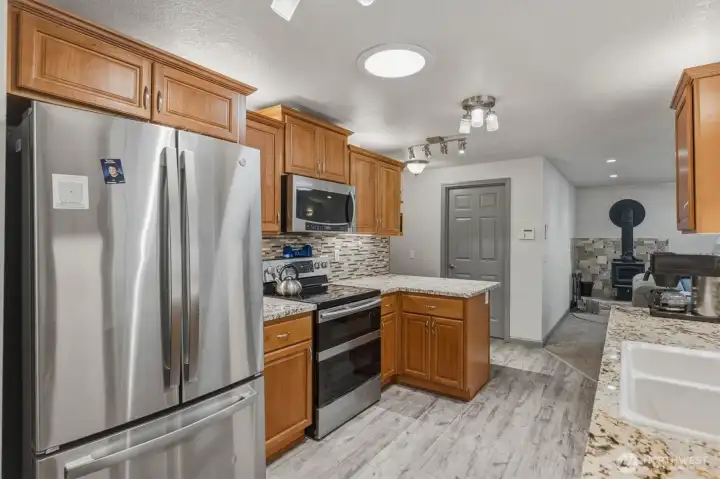 Kitchen with small eating bar