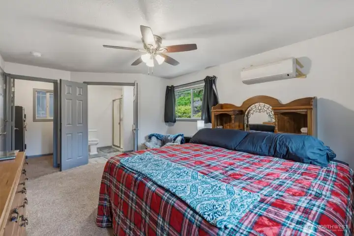 Primary bedroom with walk in closet