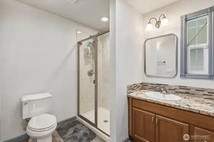 Primary bathroom with step in shower