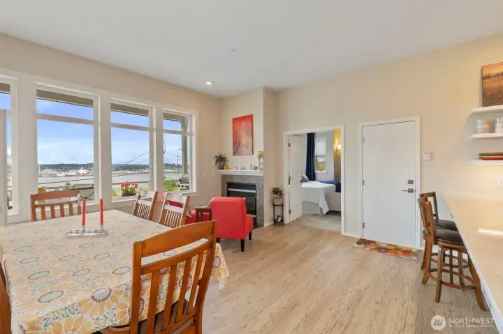 Great room with cozy gas fireplace and yet more light!