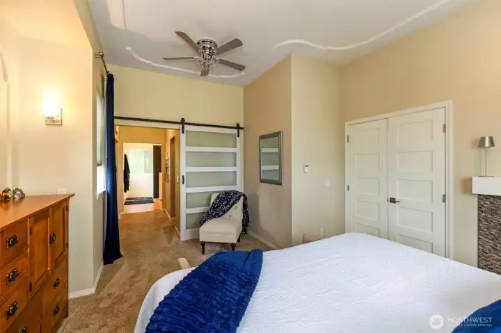 Primary bedroom, looking towards the closets and bath.