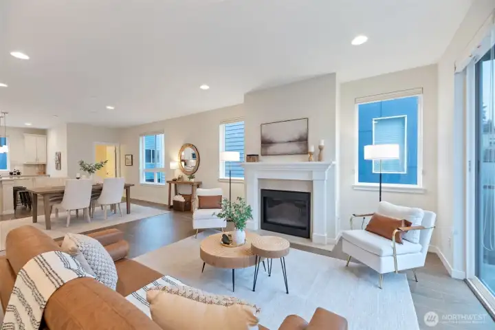Open floor plan with abundance of natural light. Convenient powder room on the same level as great/dining room/kitchen