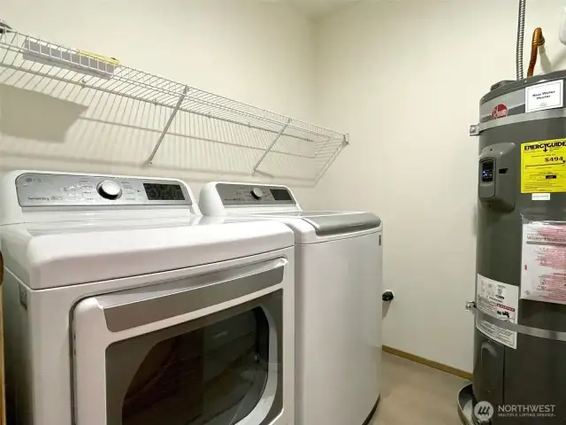 In-unit laundry room plus new water heater and newer washer/dryer