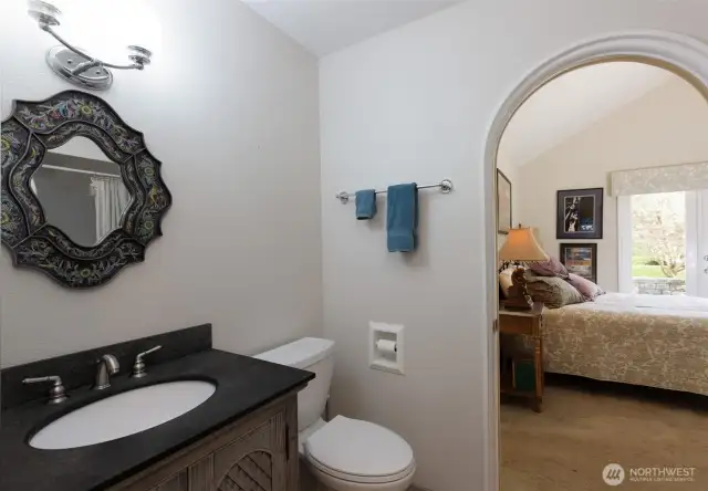 Ensuite bathroom providing your guests with ample privacy.
