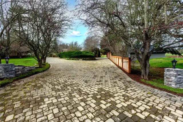 Beautifully paved circle driveway with plenty of parking for your guests.