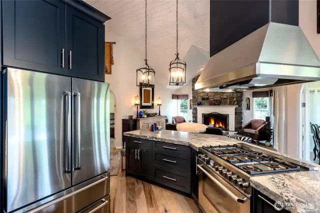 Gas range with island hood vent allowing you to keep your open concept.