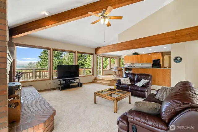 Family Room with exposed wood beams.