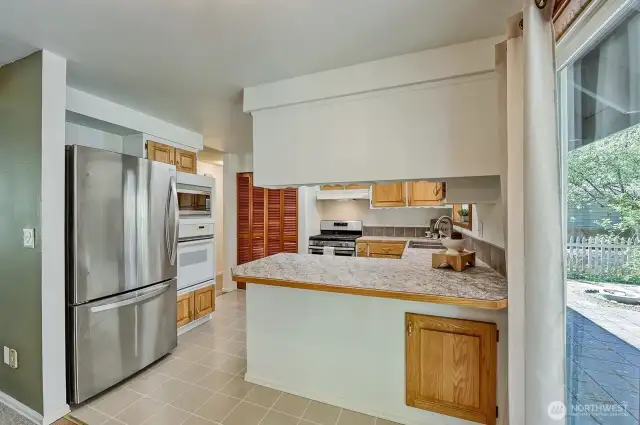 Light and bright kitchen with all gas appliances.