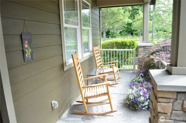 Front porch is great for relaxing and watching the goings-on in the neighborhood.