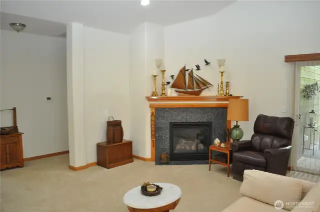 Pleasant living room sports a gas fireplace.