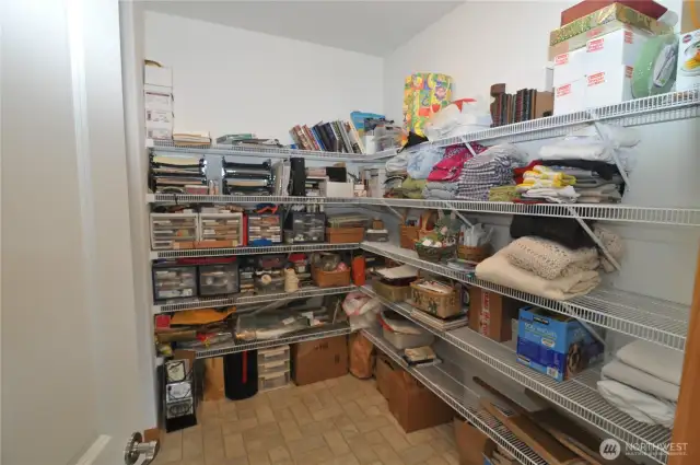 Storage room off primary has miles of space! Washer/dryer hookups to the left.
