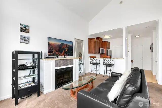 Living room features fireplace.