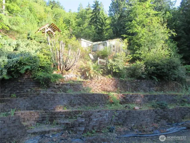Perched above terraced rockery
