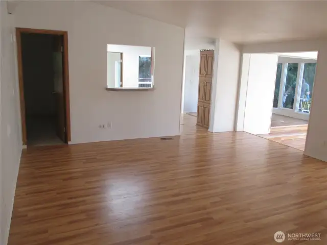 Living room looking toward kitchen and dining room