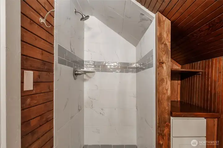 Upstairs primary bathroom shower