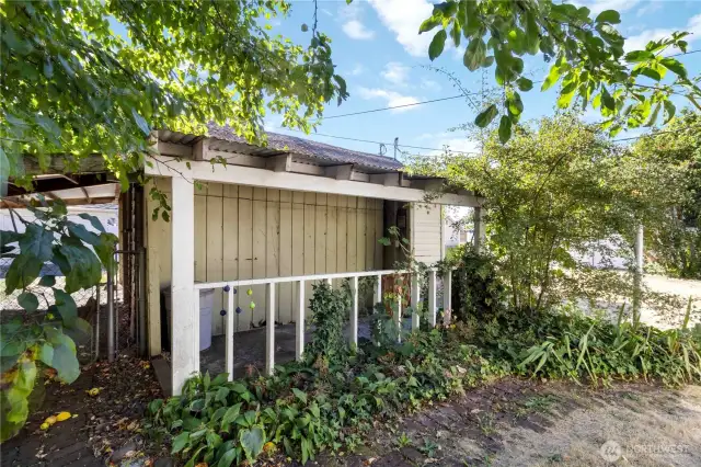 Small covered patio off garage