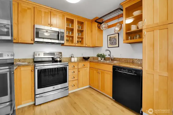 Beautiful Cook's Kitchen Shows Stainless Steel Appliances, Granite Counters & Exceptionally Attractive Shaker Style Cabinetry