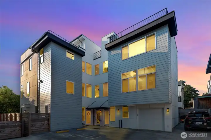 Townhome was built in 2021. Unit for sale is the SW unit, with windows on three to four sides of all levels.