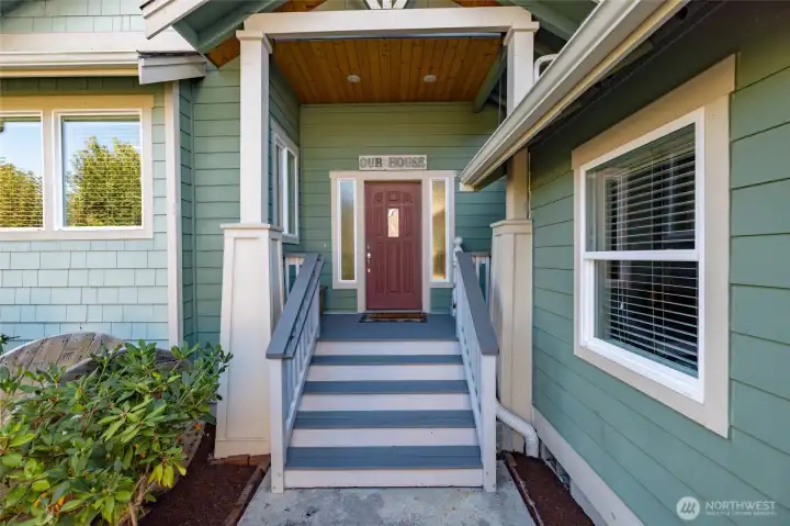 A covered front porch greets guests.