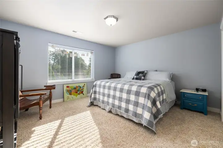 One of the two guest bedrooms upstairs.  Generous size, overlooks the back yard with peek-a-boo views of Mount Baker.