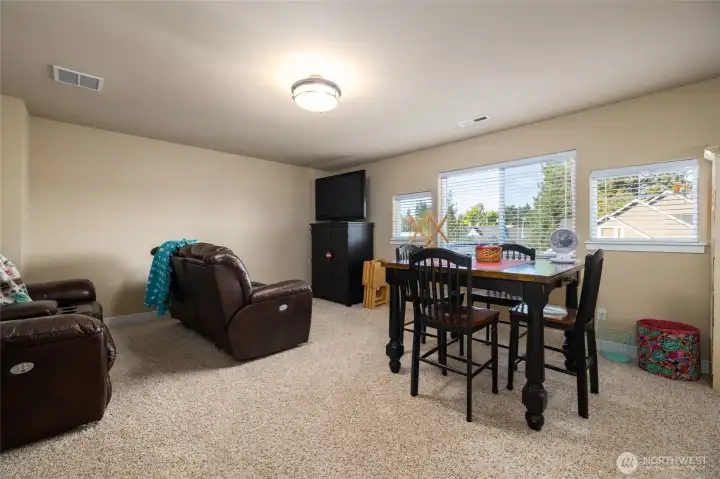Upstairs bonus room has plenty of room for crafts, games, movies, and guests.  Space for a closet, should you want to have a fourth bedroom.