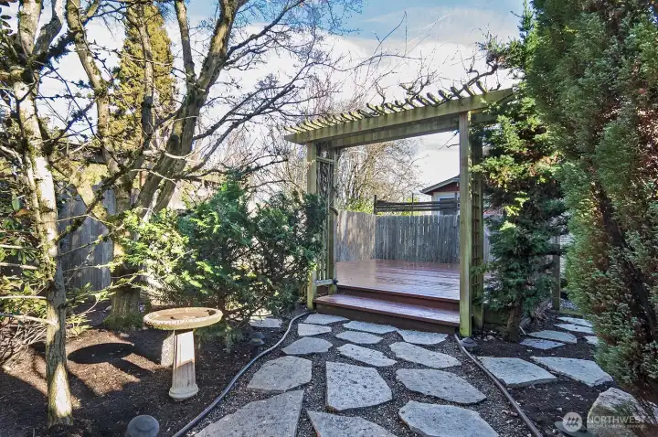 Lovely rear yard with a spacious deck.