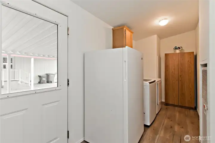 Door from covered carport into utility room