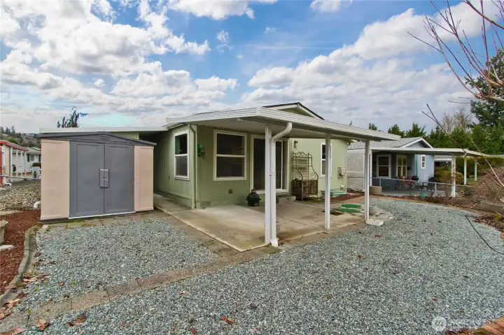Another storage area in the fenced back yard