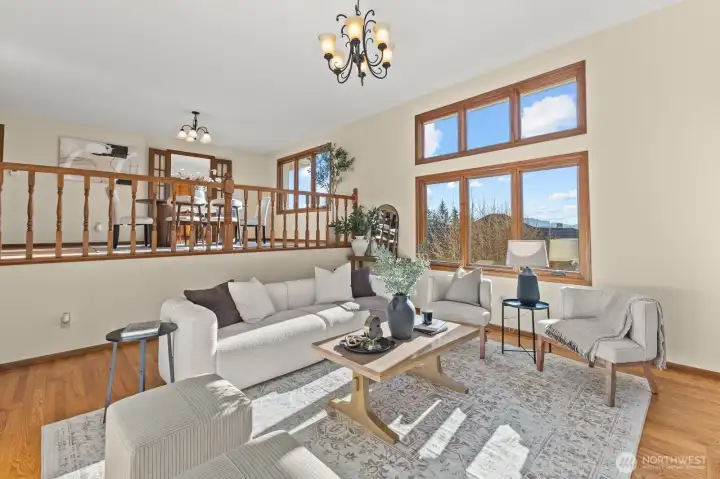 Formal living room backs up to the formal dining room, just one level above.