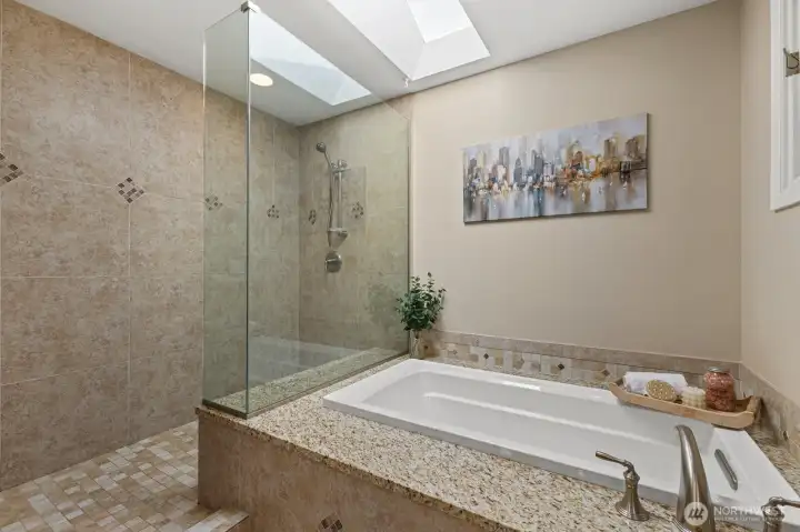 Awwwwww- sunny skylight offers natural light to the Primary bath.