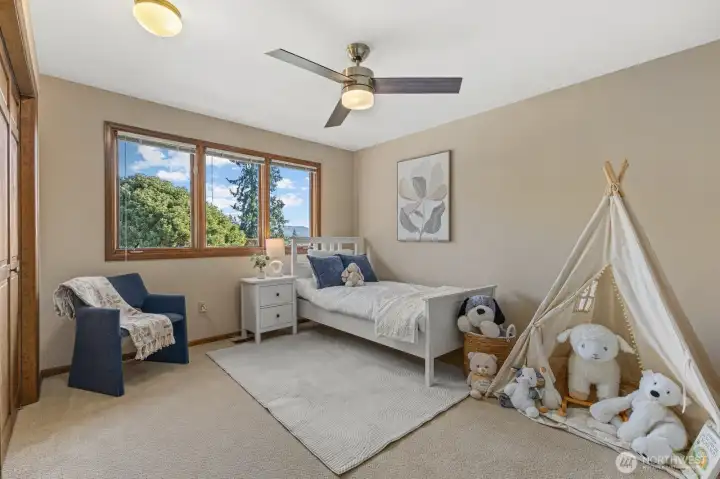 Bedroom number two is well sized and has territorial views of the back yard.