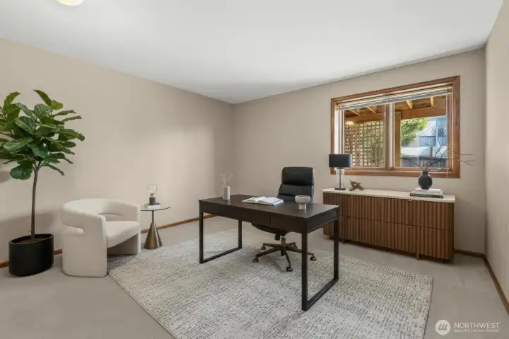 *Virtually staged Lower level bedroom #5 is staged as a well-sized work from home office.