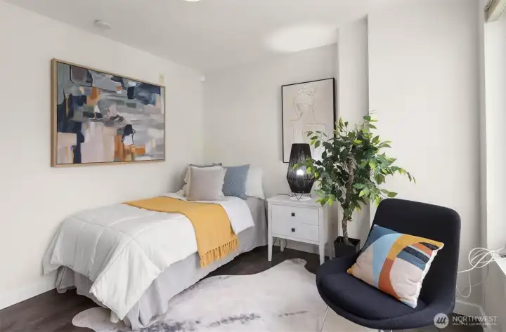 Downstairs bedroom, studio, or office.