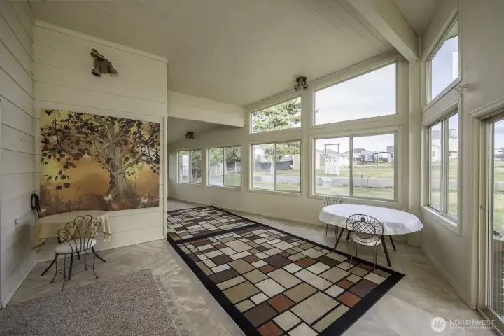 Wonderful sunroom with new windows and frames.