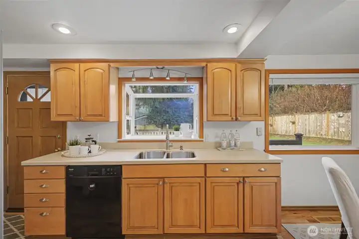 Kitchen with garden window overlooking the backyard.