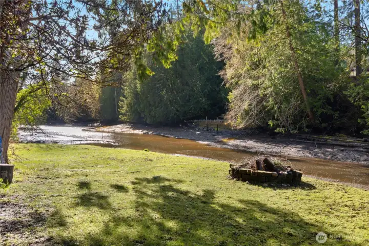Lovely green grassy area to relax or entertain. Enjoy evening bonfires by the beach.