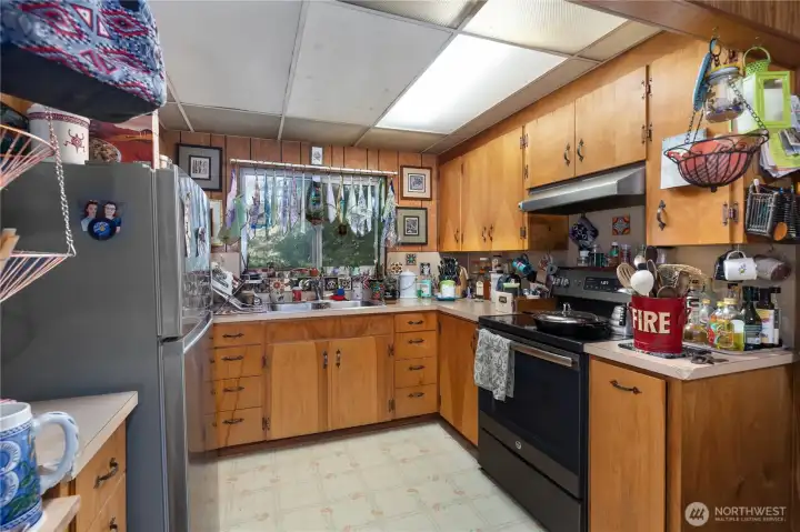 Newer refrigerator and range/stove.