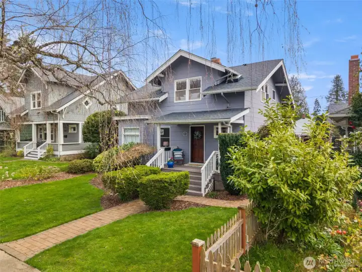 Mature shade trees frame the home starting in the spring and all the way through the fall, creating visual charm and shade.