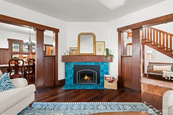 The fireplace may be a modern upgrade, but it was done with intention, blending seamlessly with the home’s era-inspired details without taking away from the original wood floors and millwork.