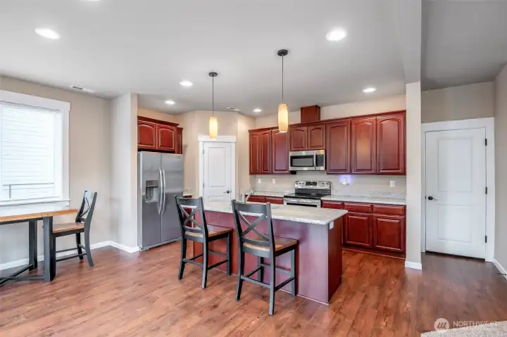 Door off kitchen leads to garage.