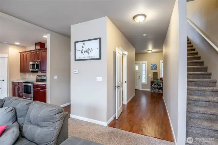 Living room. Stairs lead to loft at top of stairs.