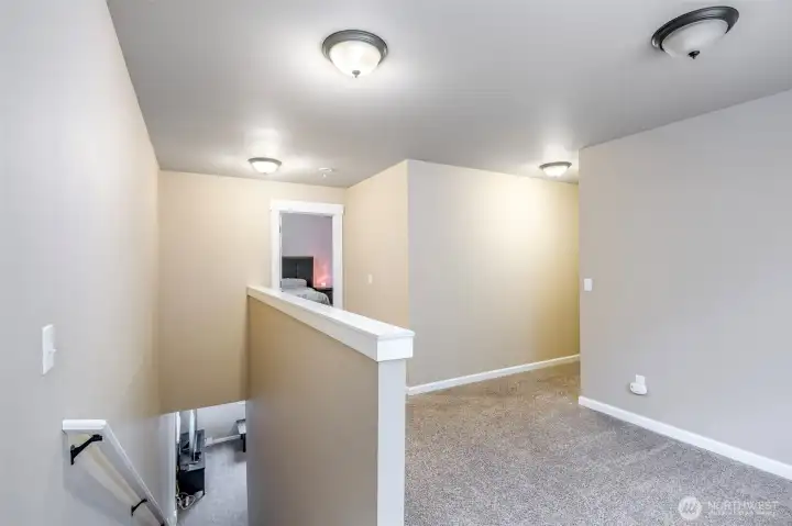 Loft area at top of stairs.