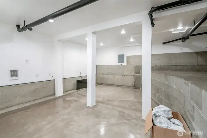 Basement!!! So much extra storage. Has own electrical panel, drainage and ventilation system.