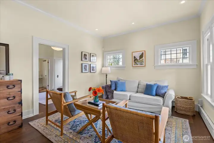 Welcoming parlor filled with natural light.