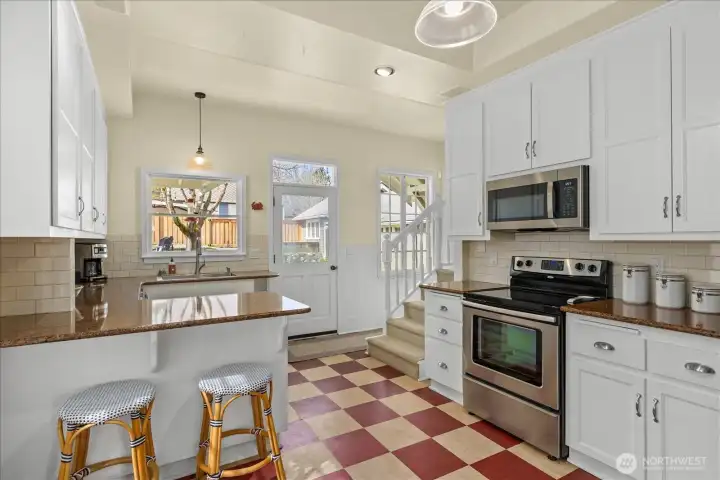 Great open kitchen space with high ceilings and natural light.