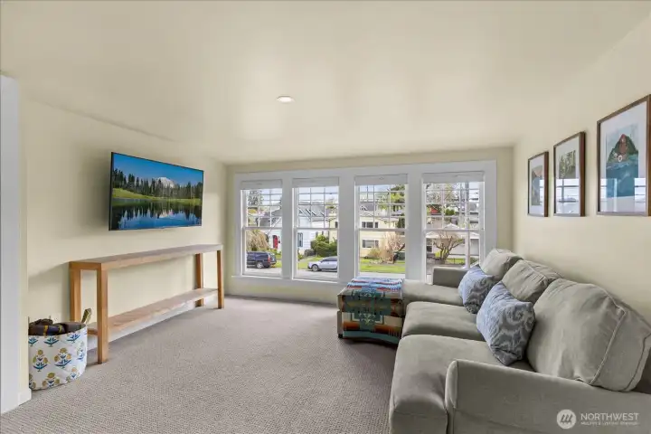 Light filled landing at the top of the stairs.