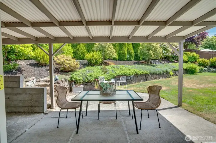 Large covered patio space - enjoy the backyard year round! Large covered patio space - enjoy the backyard year round!